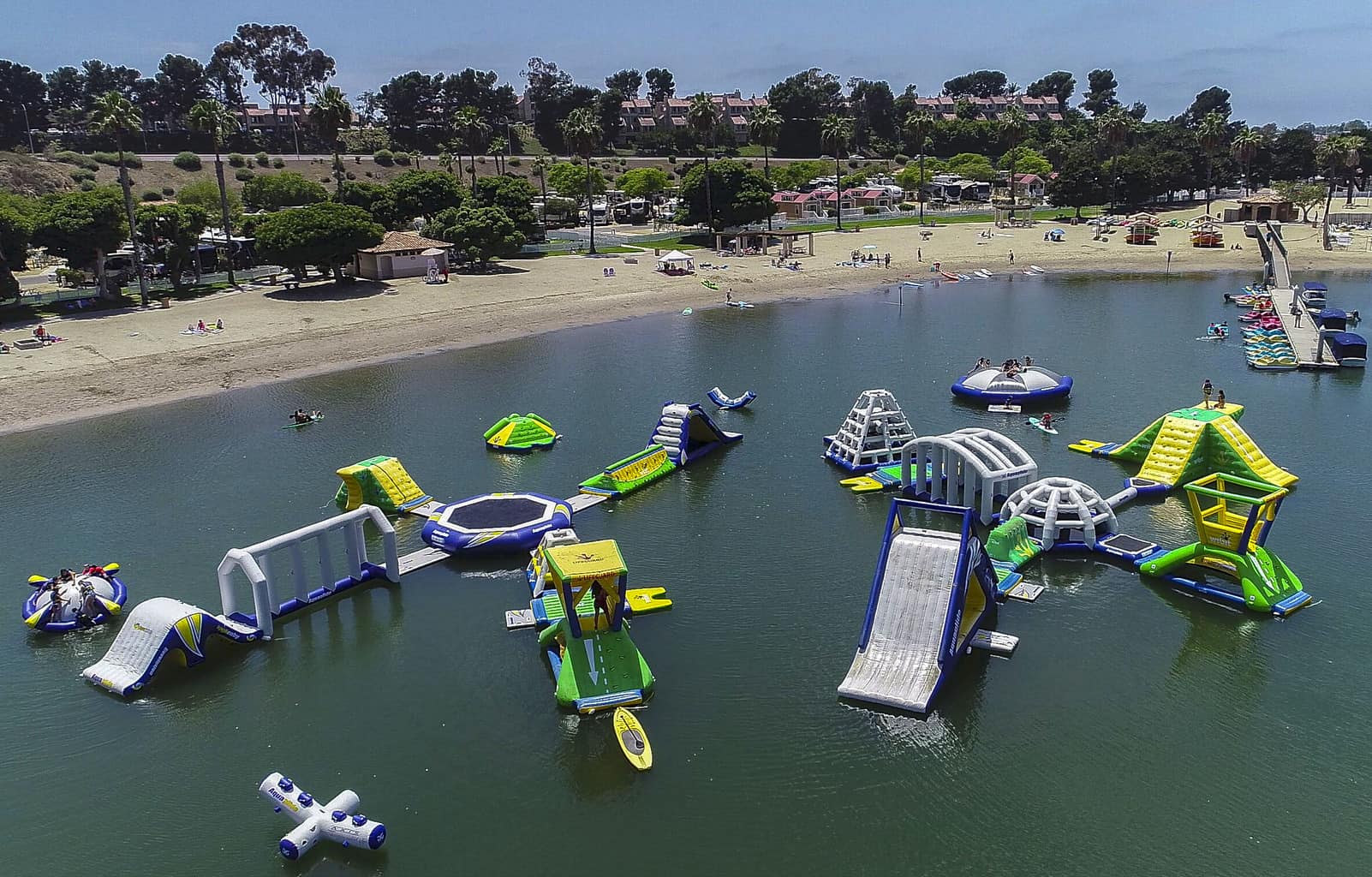 Newport Dunes Waterfront Resort has over 110 acres of gorgeous beach front property with wonderful amenities such as a waterpark, stand up paddle boarding, swimming, kayaking and a playground on the beach for kids.