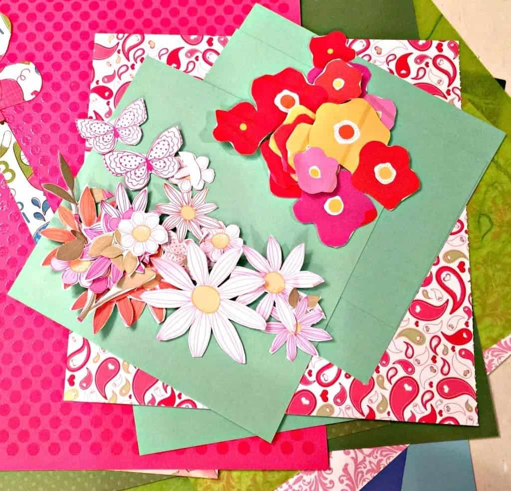 Make this very easy Mother's Day Paper Flower Craft! All you need is a dolie, craft paper, white glue, scissors and ribbon.