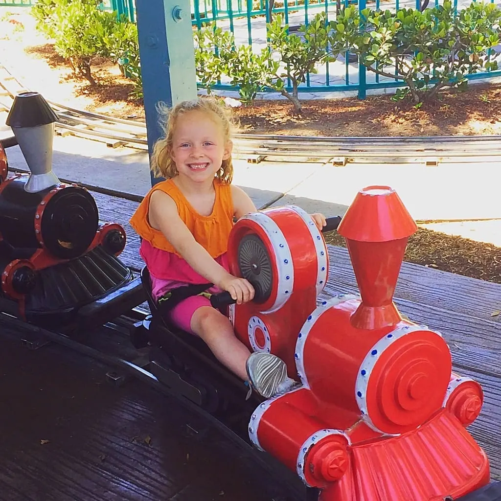 Top 5 Reasons to Visit Adventure City in Anaheim, California including free parking, theme rides for all ages, inexpensive birthday parties, Thomas The Train play area and only $19.95 for admission!