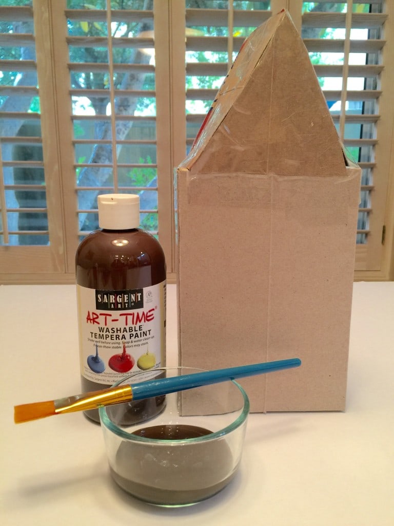 How to make a Homemade Gingerbread House out of cardboard and simple craft supplies.