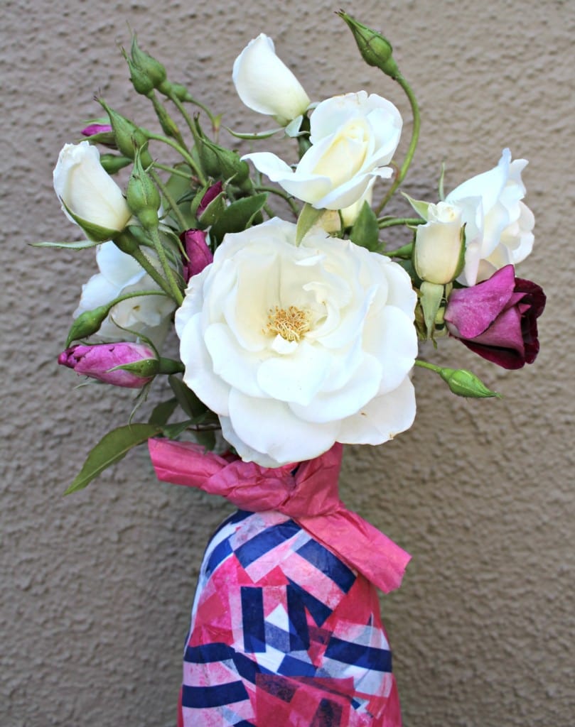 Make this Easy Plastic Bottle Flower Vase out of any type of recyclable bottle and tissue paper. It is the perfect Mother's Day Kids Craft too.
