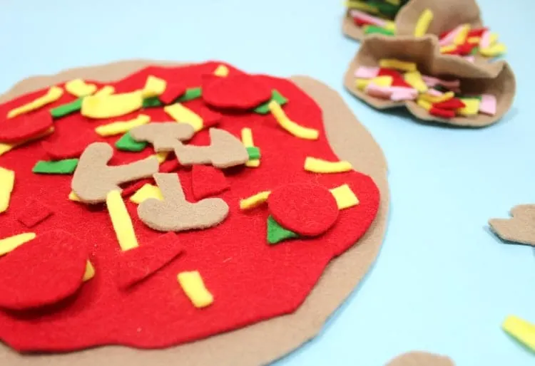 Are you looking for a fun pizza inspired craft or activity for kids? Check out this list of 18 Playful Pizza Activities for Kids that are perfect for children of all ages! These activities help kids work on many important skills such as eye-hand coordination, fine motor tasks, addition and subtraction, and using their imagination, just to name a few.