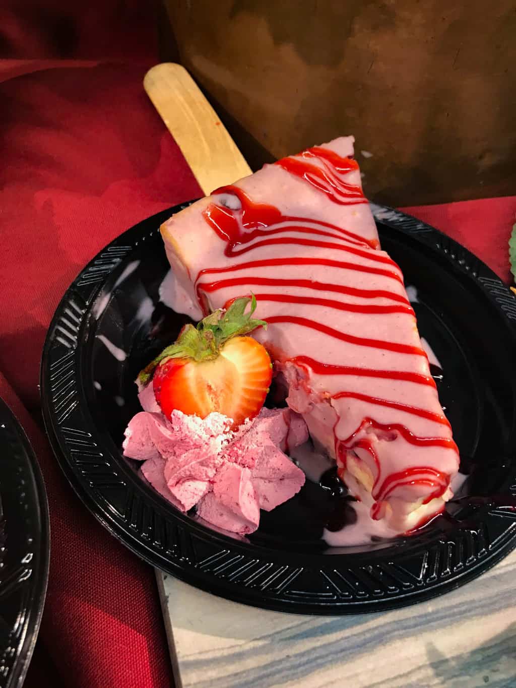 Chocolate Covered Boysenberry Cheesecake on a stick at Knott's Boysenberry Festival