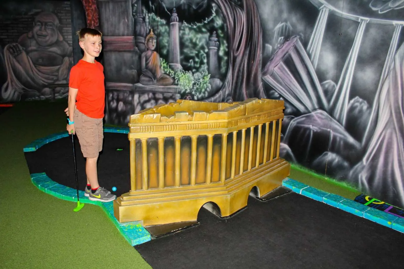 Get ready to experience miniature golf like never before! Glo Mini Golf in Riverside is a state of the art, indoor, glow in the dark mini golf course. The facility features hundreds of black lights that illuminate the course in a kaleidoscope colors! Travel the world with our 27 ‘World Wonder’ themed holes. Go from the Great Pyramids of Egypt to the Running of the Bulls in Spain to Niagara Falls in New York all lit up by colorful glow in the dark paint.