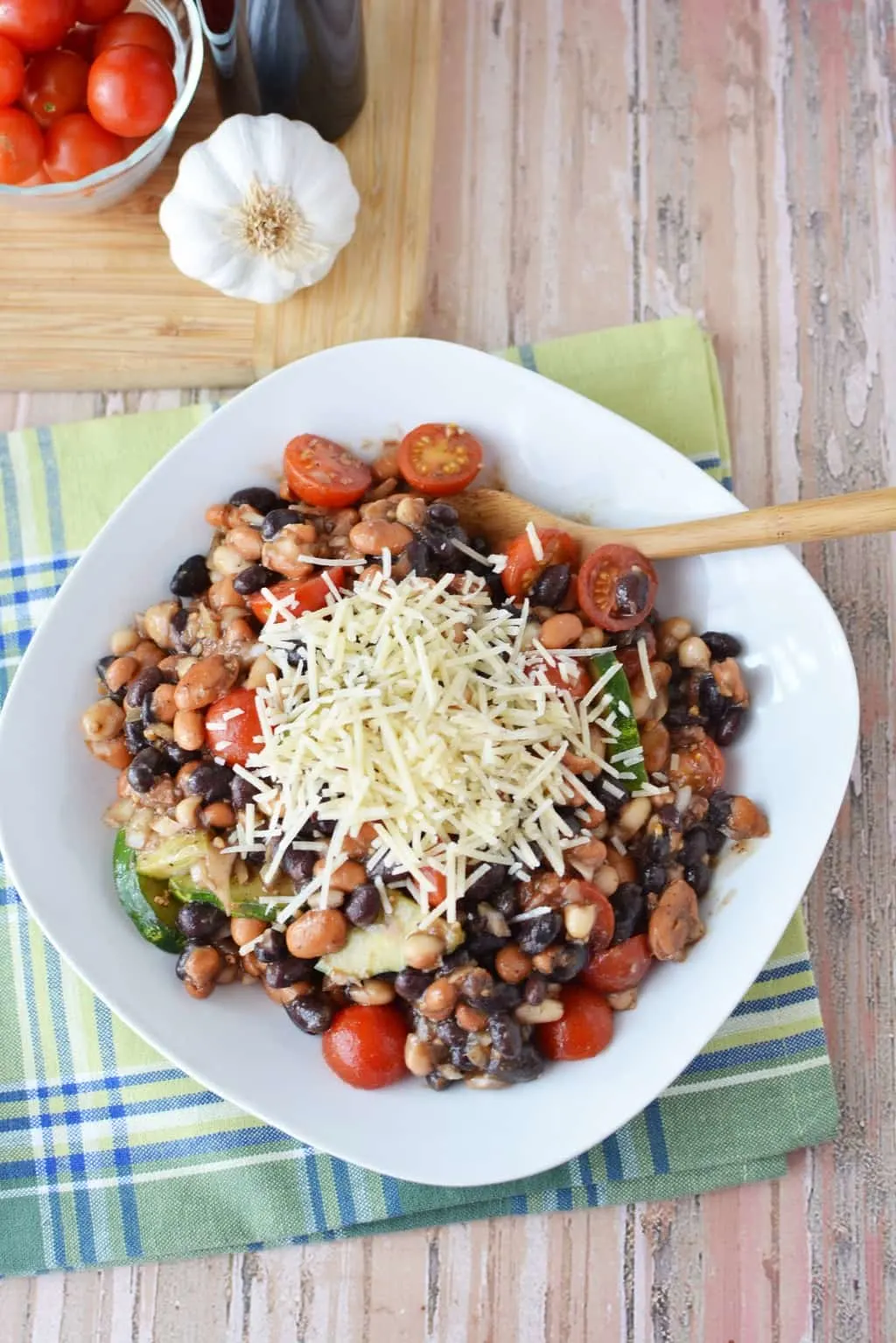 Are you planning a game day or super bowl party? This Easy Cold Bean Salad has the taste of 'mush' beans along with the crunch of an onion and a cucumber.  It also has a balsamic-y taste because of the vinegar, but it's not too strong.