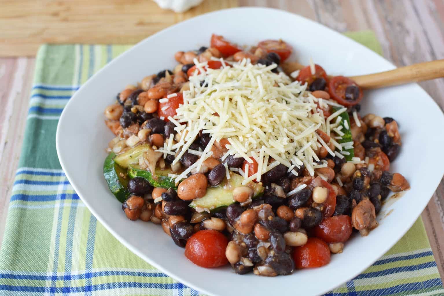 Are you planning a game day or super bowl party? This Easy Cold Bean Salad has the taste of 'mush' beans along with the crunch of an onion and a cucumber.  It also has a balsamic-y taste because of the vinegar, but it's not too strong.