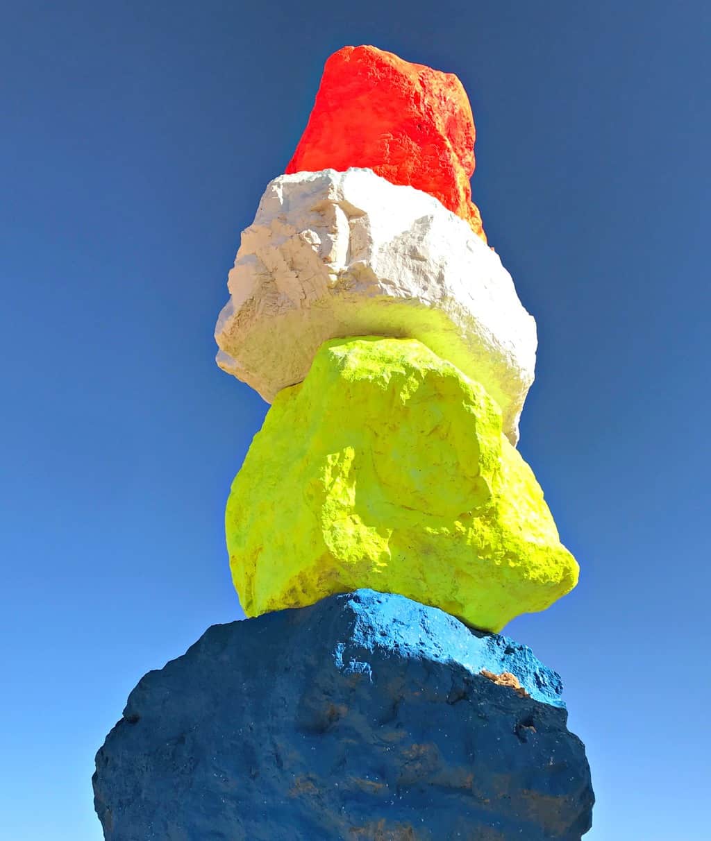 As one of the largest land-based art installations in the United States, Seven Magic Mountains, located right outside of Las Vegas, is bringing happiness to the desert.  Positioned within the Ivanpah Valley and surrounded by the local mountains, Seven Magic Mountains stands out as eye candy along the freeway.  Each locally-sourced limestone boulder boasts a different fluorescent color ranging from neon pink to deep ocean blue. The art exhibit is open year round.