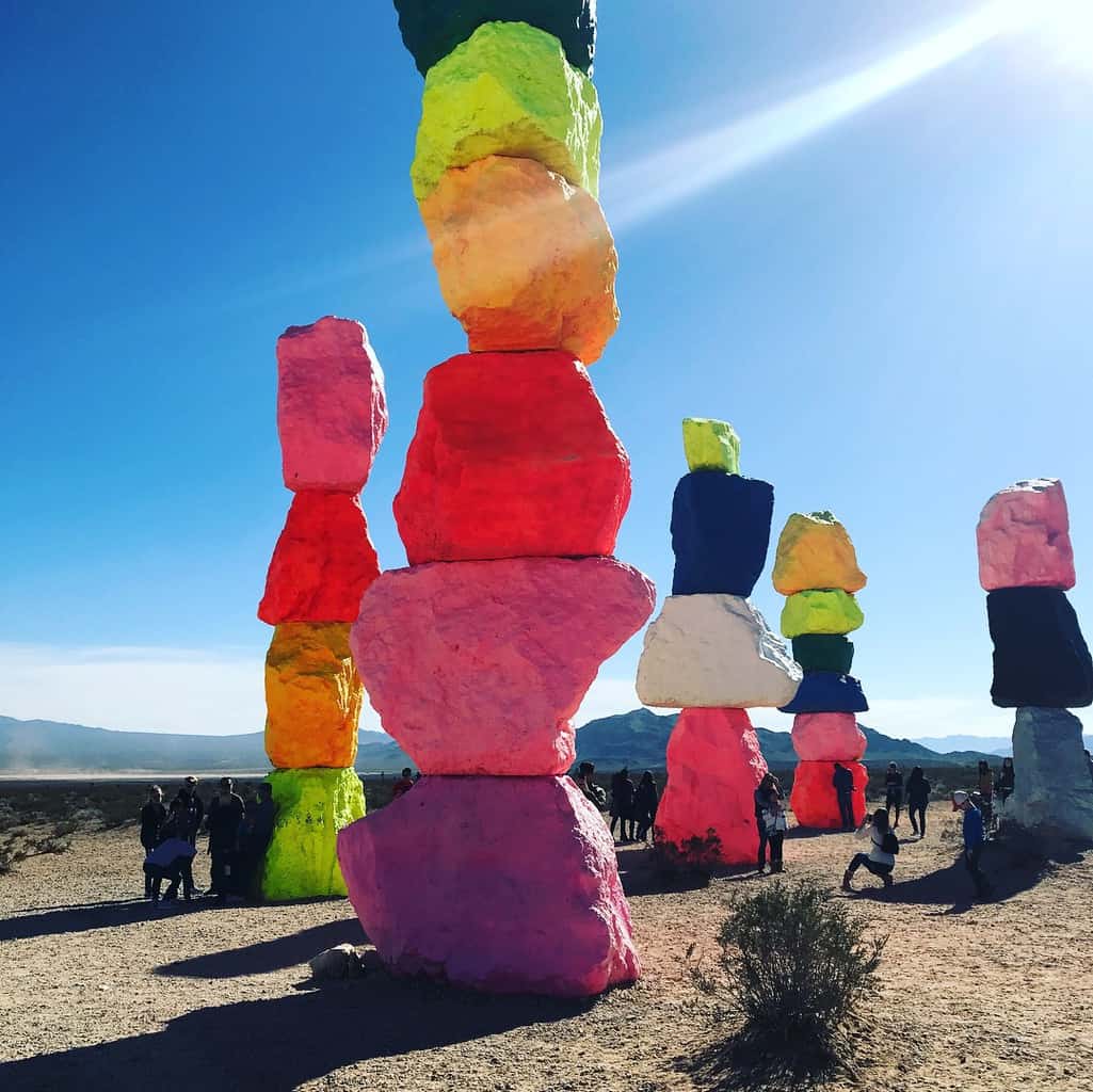 As one of the largest land-based art installations in the United States, Seven Magic Mountains, located right outside of Las Vegas, is bringing happiness to the desert.  Positioned within the Ivanpah Valley and surrounded by the local mountains, Seven Magic Mountains stands out as eye candy along the freeway.  Each locally-sourced limestone boulder boasts a different fluorescent color ranging from neon pink to deep ocean blue. The art exhibit is open year round.