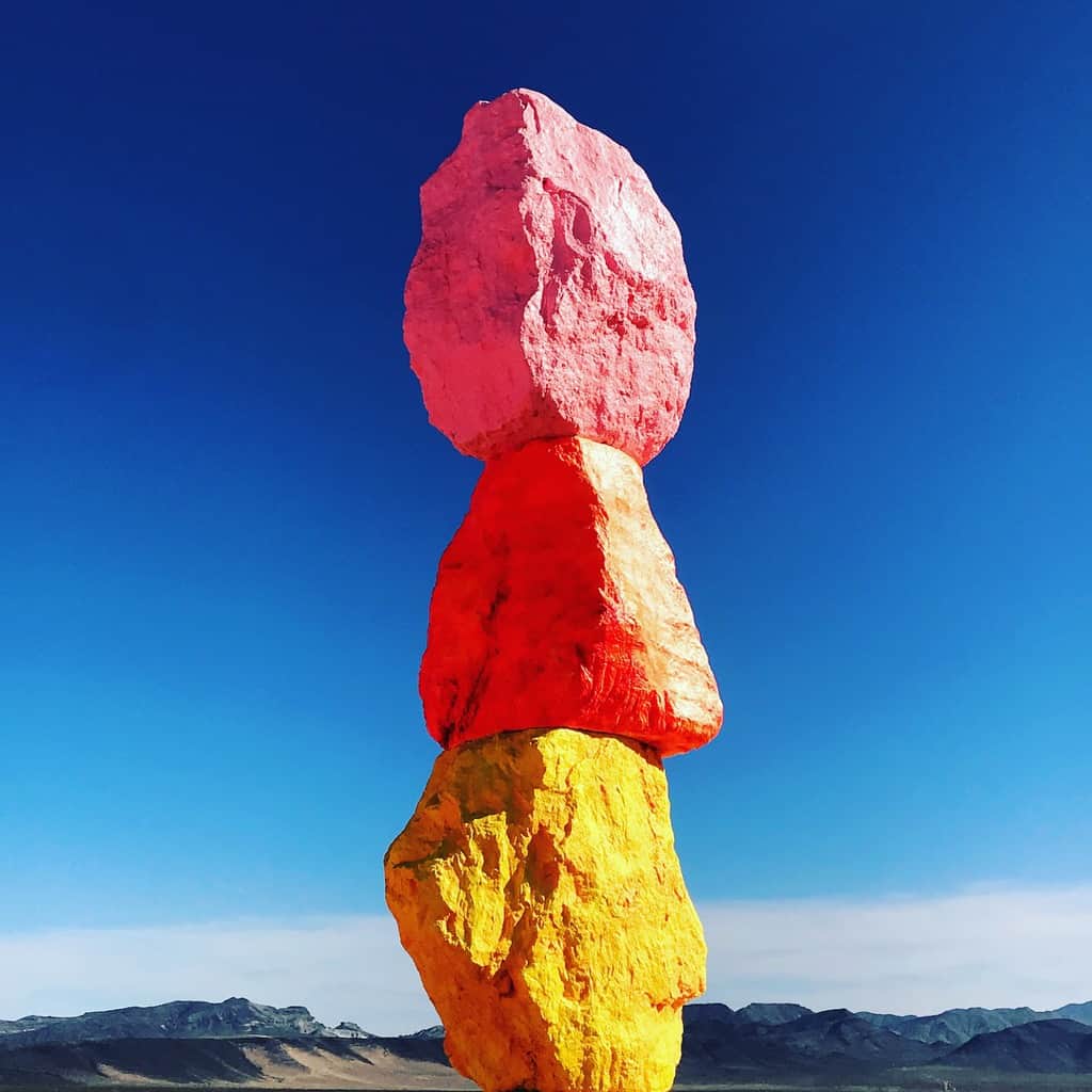 As one of the largest land-based art installations in the United States, Seven Magic Mountains, located right outside of Las Vegas, is bringing happiness to the desert.  Positioned within the Ivanpah Valley and surrounded by the local mountains, Seven Magic Mountains stands out as eye candy along the freeway.  Each locally-sourced limestone boulder boasts a different fluorescent color ranging from neon pink to deep ocean blue. The art exhibit is open year round.