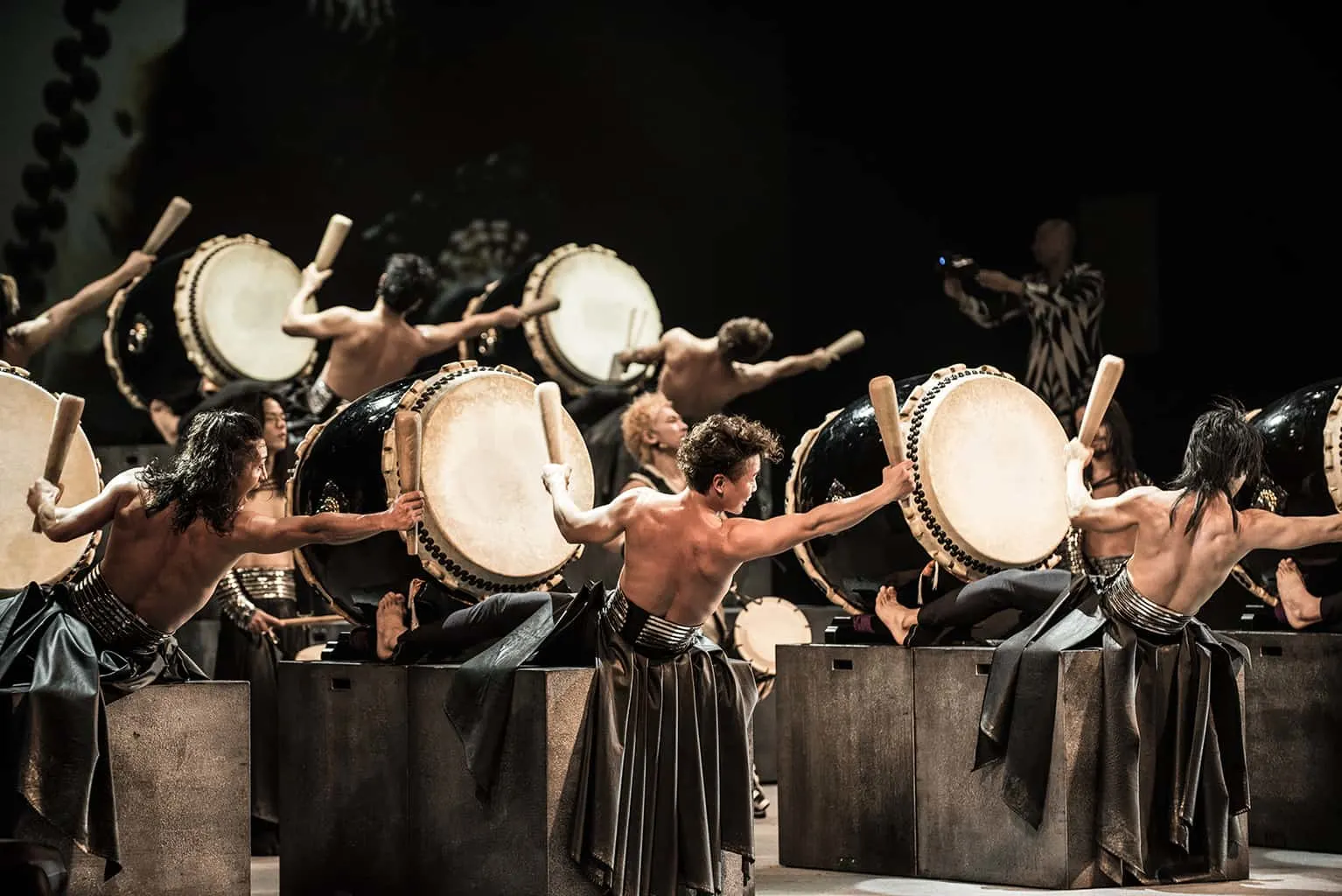 DRUM TAO is known for combining music and dance to reflect Japanese tradition while incorporating other Asian cultural influences.  Breaking past the traditional notions of taiko, DRUM TAO continues to create an entirely new art form that is modern yet retains sense of tradition.