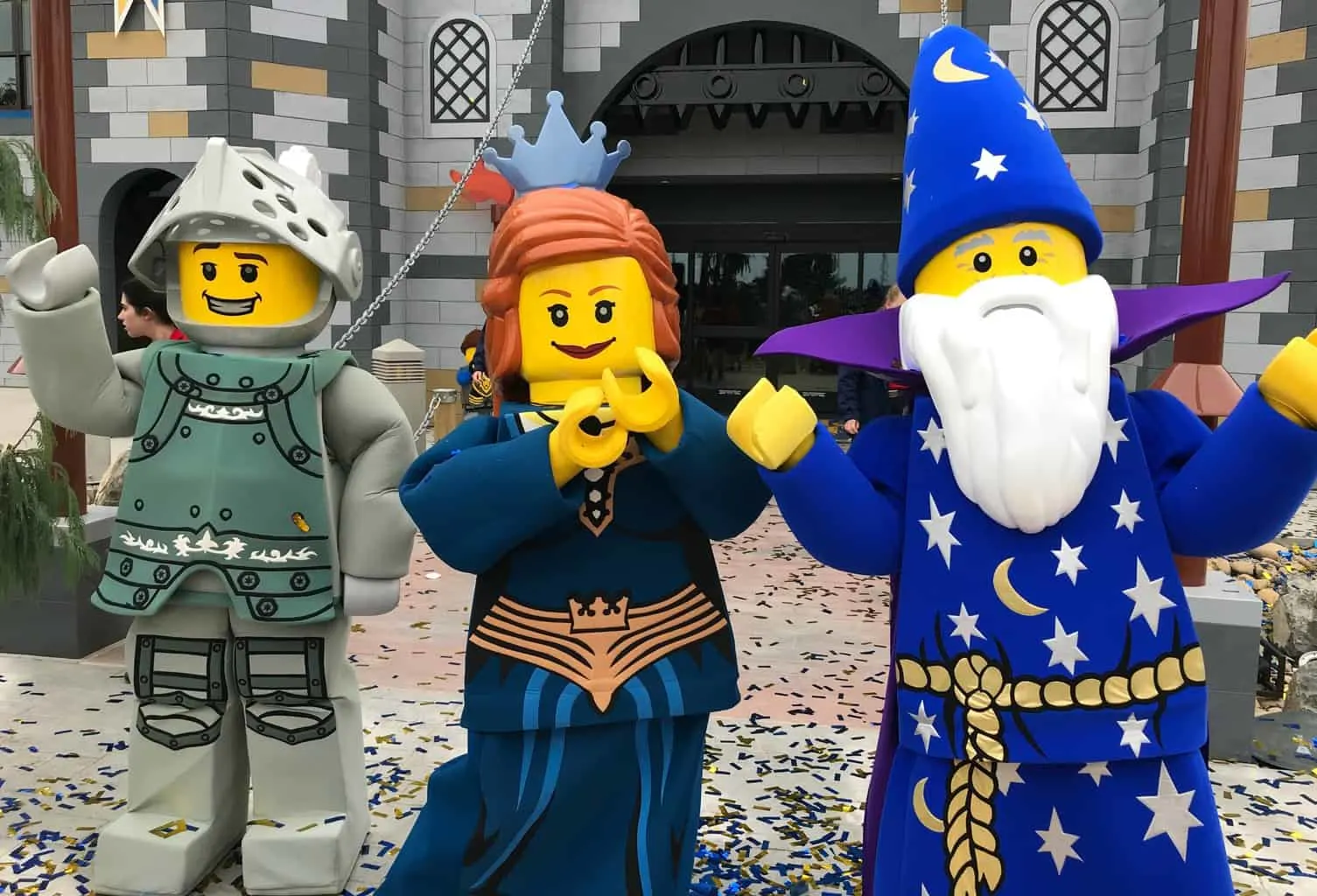 Merlin wizard standing in front of the LEGOLAND Castle Hotel in California
