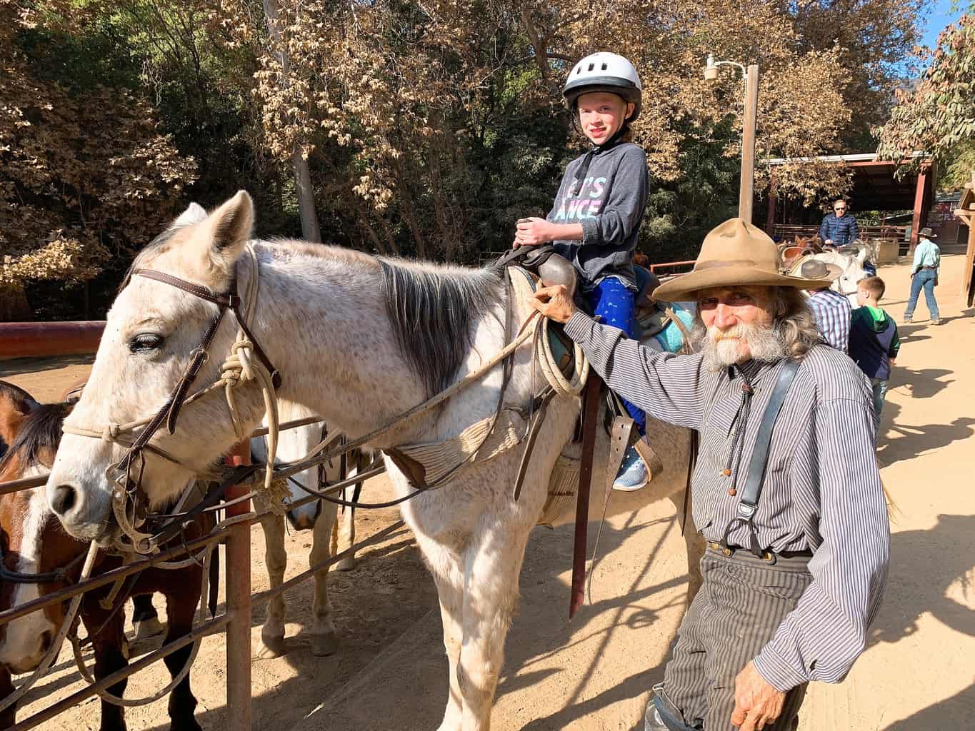 Girl going horseback riding at Circle Bar B Stables Santa Barbara