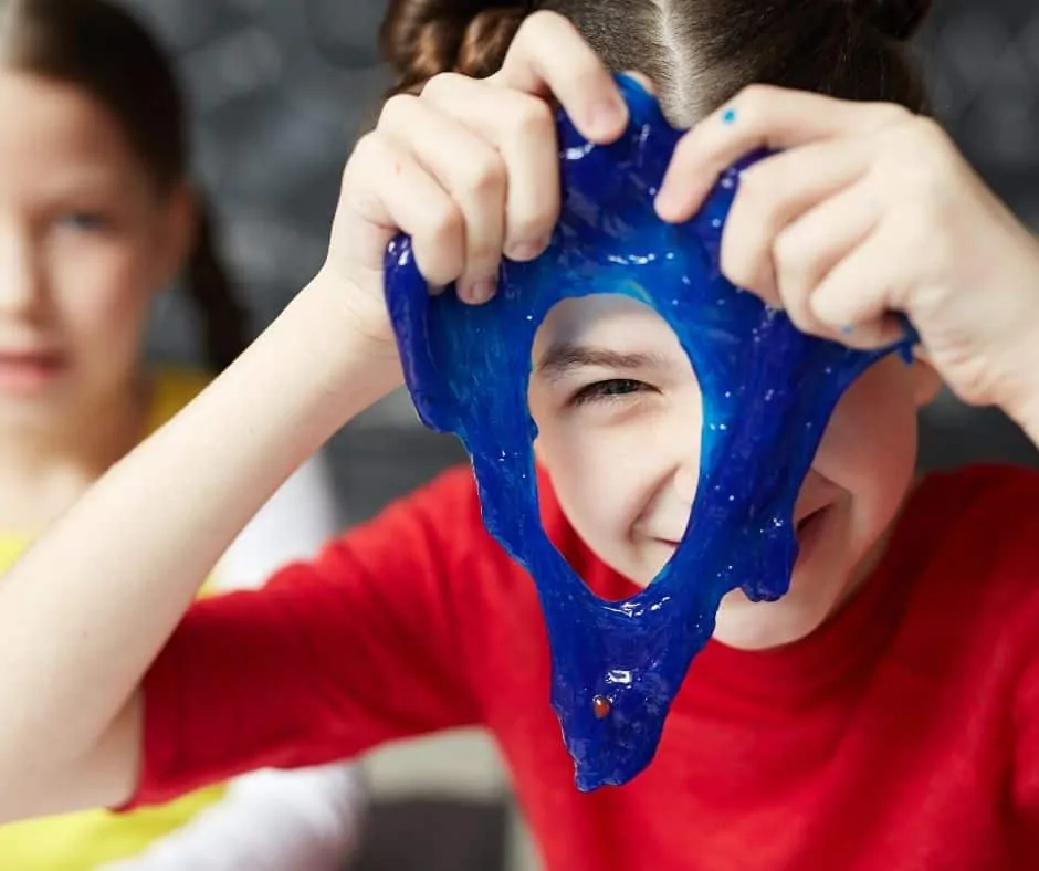 Boy playing with slime